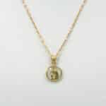 Medalla Virgen Niña de oro amarillo 18k con cristal combinada con cadena caffe de 40cm