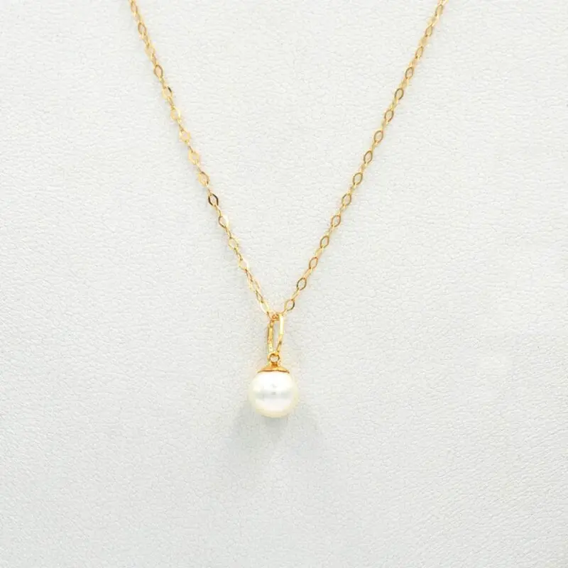 CON_PERLA Conjunto de oro 18k con perla natural. Una joya clasica y atemporal, perfecta como regalo para uan fecha especial.