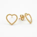 Aro con forma de corazón, de oro amarillo 18k.