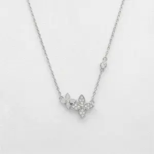 Conjunto Flor de plata italiana 925 con baño de rodio